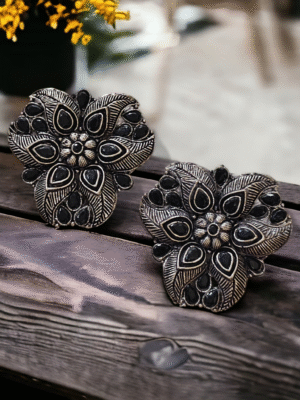 Black kundan earrings in German silver
