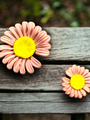 Mismatched floral earrings for quirky look