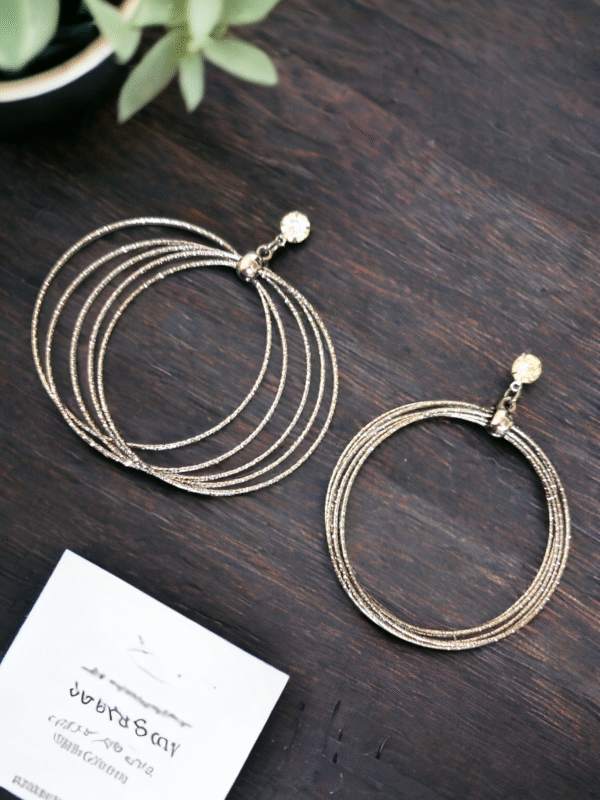 Silver Dangling Hoops - trendy statement fashion earrings