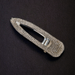 Stone-studded hair clip for party or festive wear