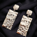 Stylish distress pattern silver statement earrings perfect for everyday wear or festive sparkle.