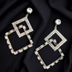 Minimal silver triangle danglers perfect for edgy, geometric fashion lovers.