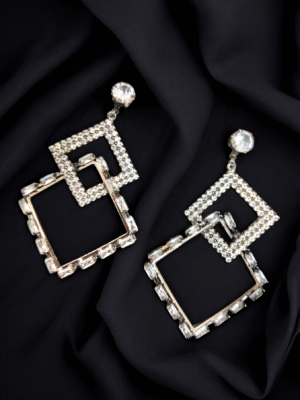 Minimal silver triangle danglers perfect for edgy, geometric fashion lovers.