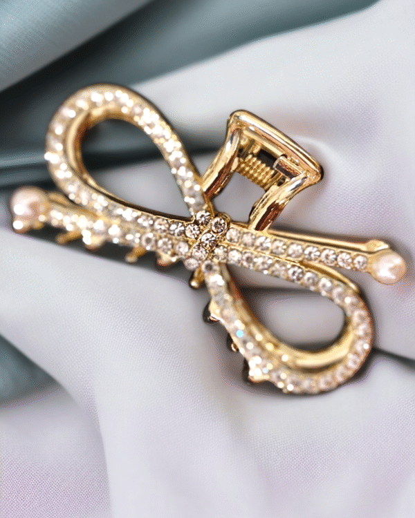 Stone claw hair clip with infinity design