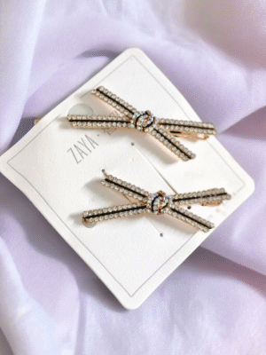 Stone-studded cross hair clips for girls
