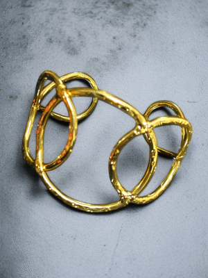 Bold brass geometric statement cuff