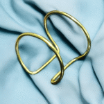 Sculpted designer brass cuff
