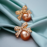 Bow-style pearl earrings with anti-tarnish finish