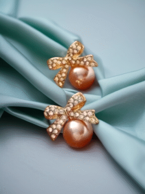 Bow-style pearl earrings with anti-tarnish finish